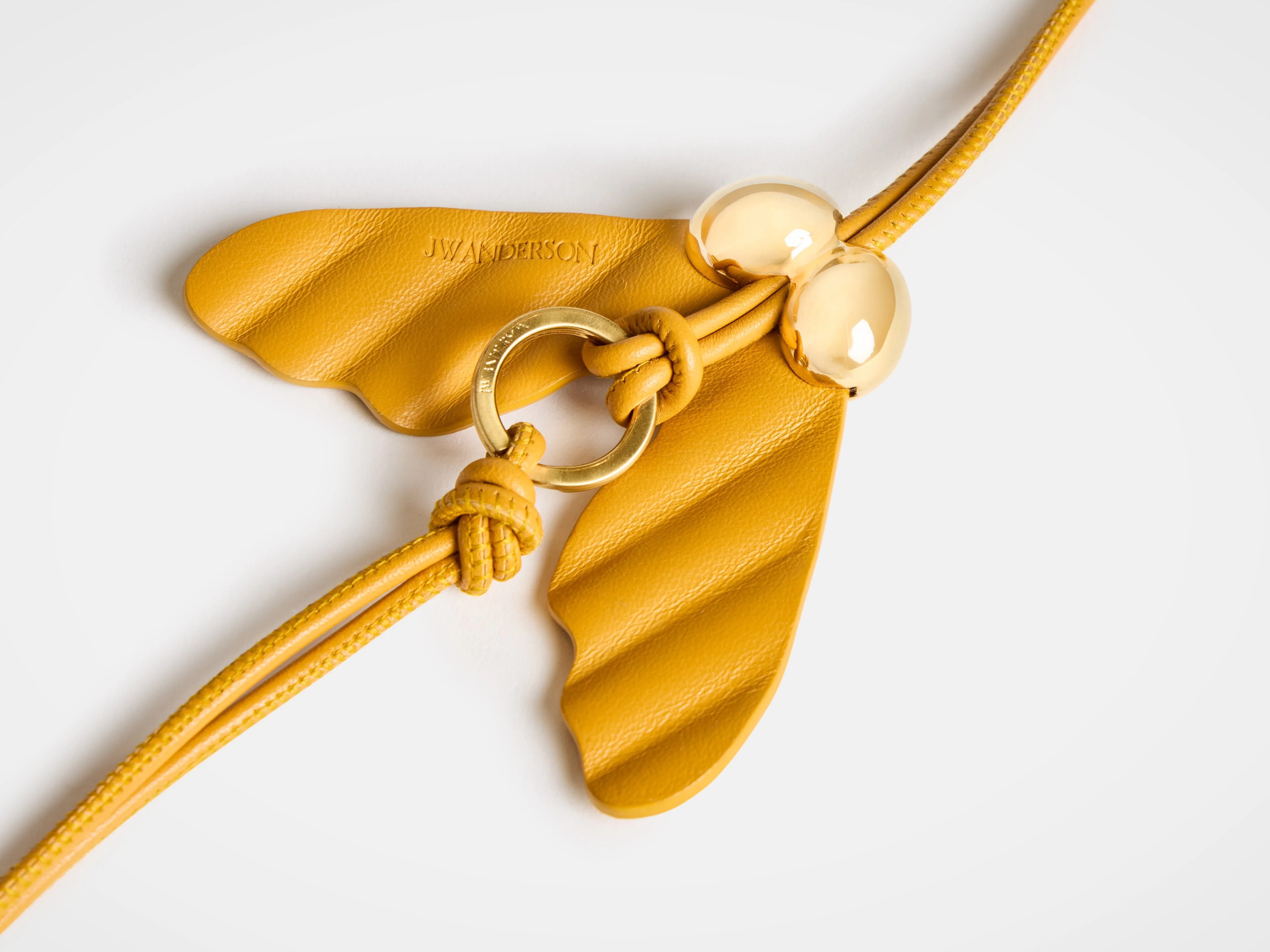 LEATHER HELICOPTER SEED CHARM